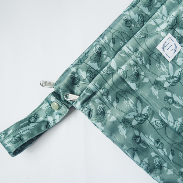 Heritage hug wetbag teal poppies